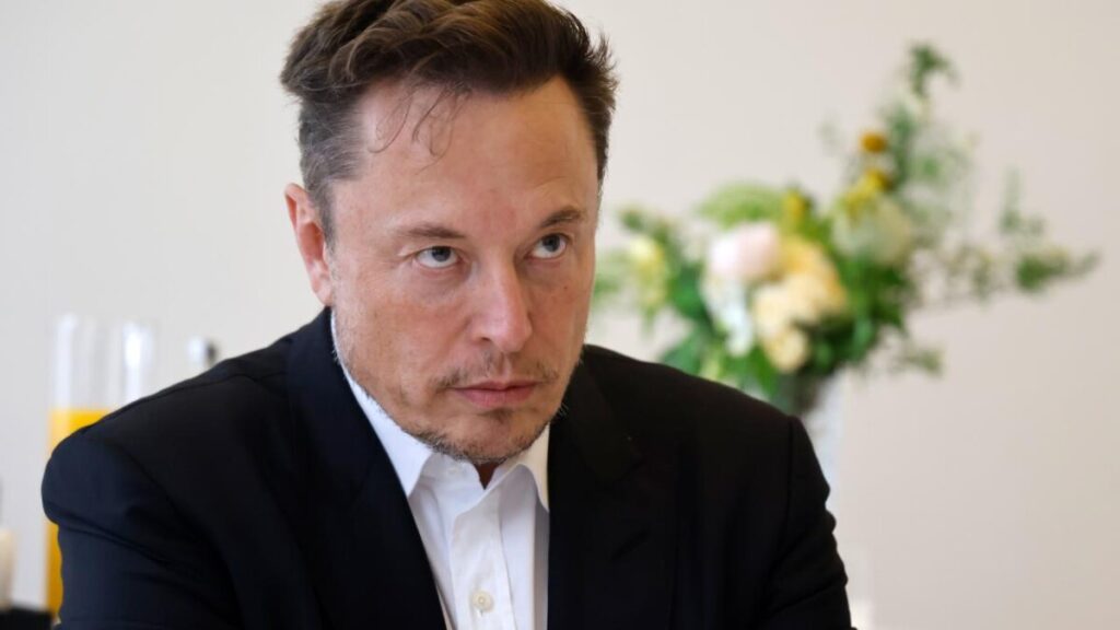 Elon musk ihs 2105717 scaled