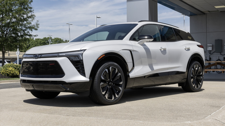White Chevrolet Blazer EV at a charging station