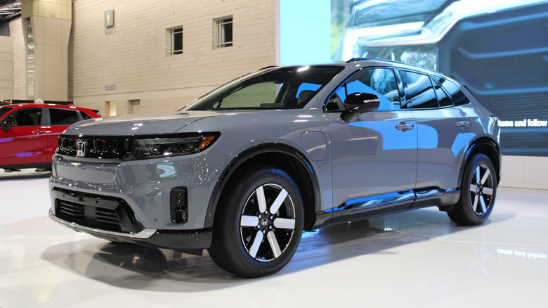 Gray Honda Prologue in a showroom